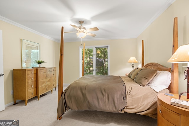 bedroom featuring light colored carpet, ceiling fan, and crown molding