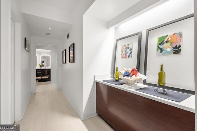 hallway featuring light hardwood / wood-style flooring