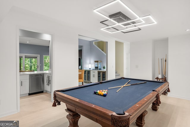 recreation room with beverage cooler, light hardwood / wood-style floors, and billiards