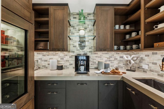 kitchen with backsplash and sink