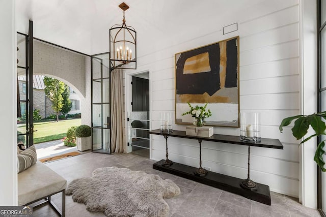 211 N Esplanade, Alpharetta, GA 30009 - living area with a chandelier and tile patterned floors