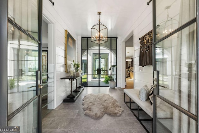 211 N Esplanade, Alpharetta, GA 30009 - foyer with french doors and a chandelier