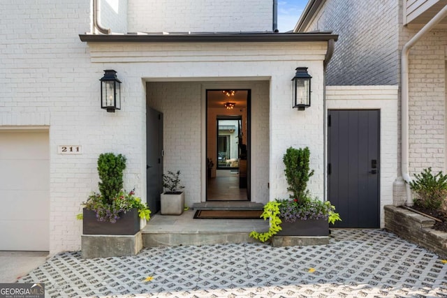 property entrance with a garage