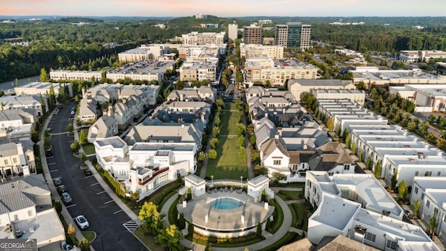 211 N Esplanade, Alpharetta, GA 30009 - drone / aerial view of a pool area and a heavily wooded area