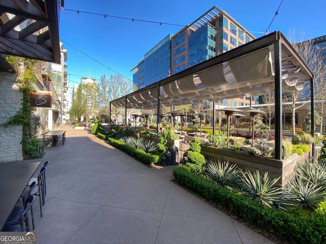 view of home's community with a pergola