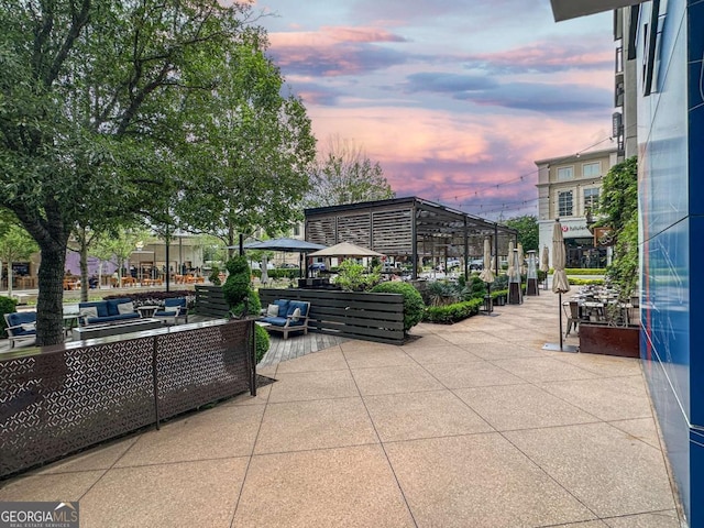 view of property's community with a gazebo and a patio