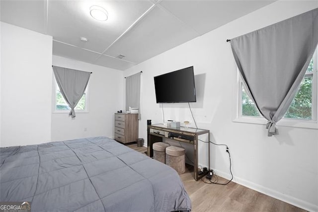 bedroom featuring hardwood / wood-style flooring