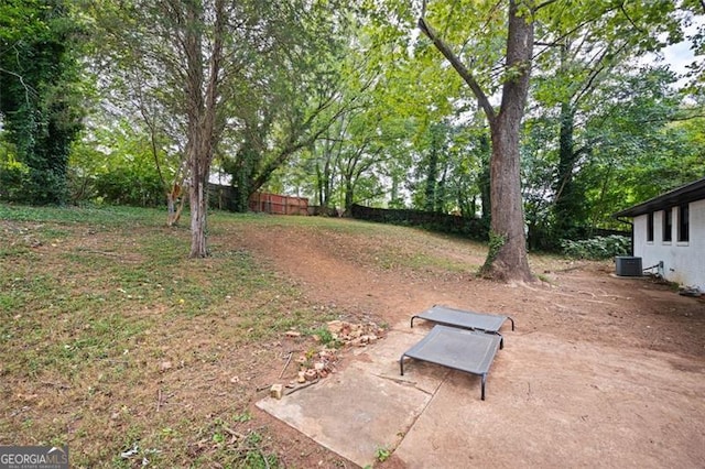 view of yard with central AC