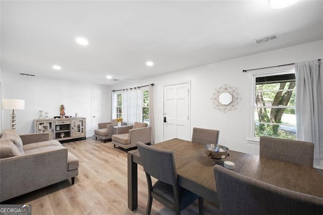 dining room with light wood-type flooring