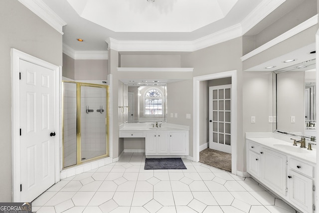 bathroom with an enclosed shower, vanity, and ornamental molding