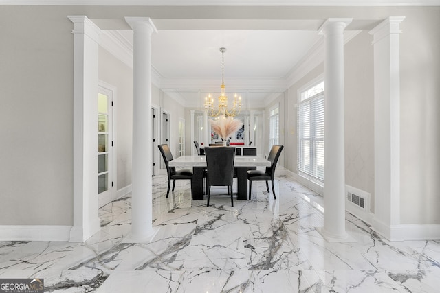 dining room featuring crown molding and an inviting chandelier