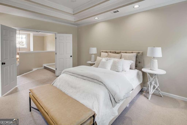 carpeted bedroom with a raised ceiling and crown molding