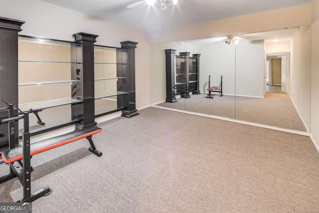 exercise room featuring carpet floors and ceiling fan