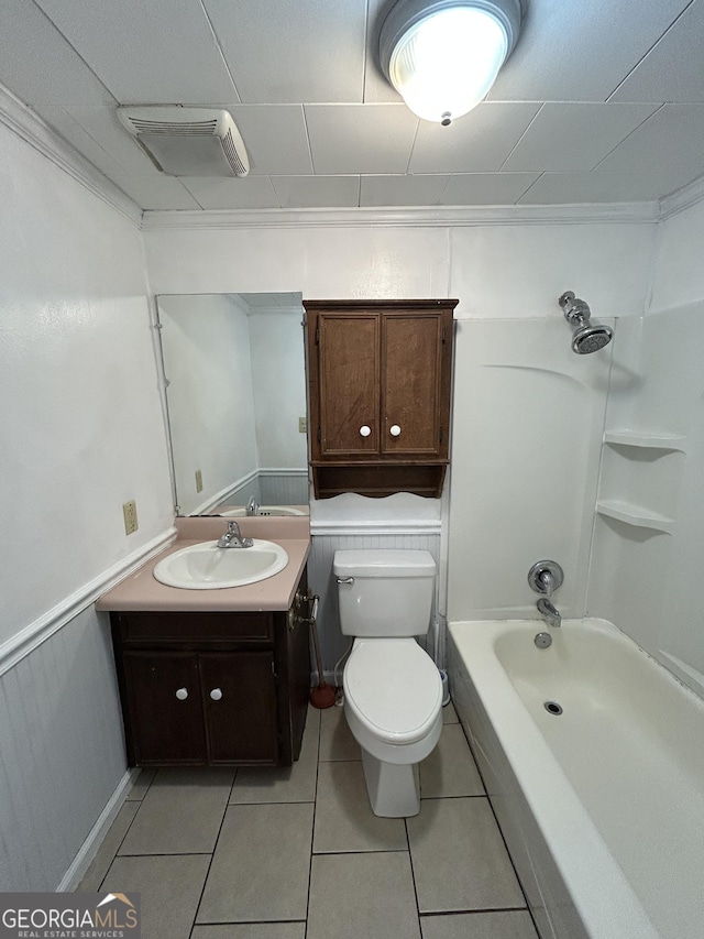 bathroom featuring visible vents, toilet, vanity, tile patterned flooring, and shower / bathtub combination