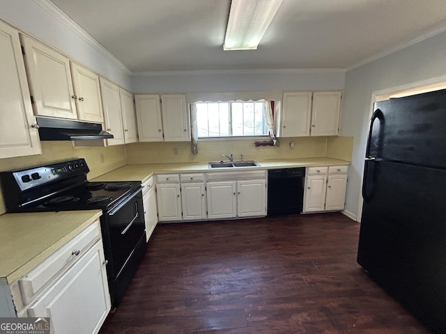 kitchen with under cabinet range hood, a sink, white cabinetry, light countertops, and black appliances