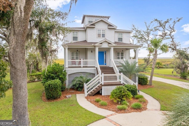 view of front of home featuring a porch and a front yard