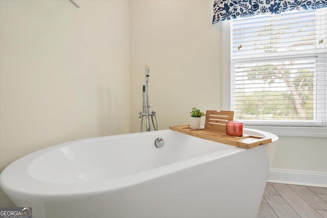 bathroom with a washtub