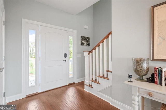 entrance foyer featuring hardwood / wood-style flooring