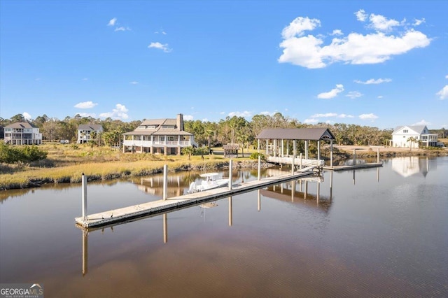 dock area featuring a water view