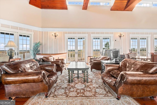 living room with wood-type flooring and french doors