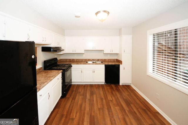 kitchen featuring white cabinets, sink, dark wood-type flooring, and black appliances