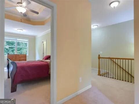 bedroom featuring carpet flooring, ceiling fan, and ornamental molding