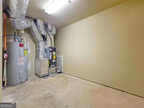 utility room with water heater