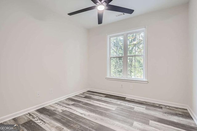 unfurnished room featuring ceiling fan and wood-type flooring