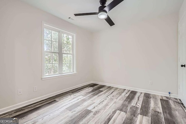 unfurnished room featuring wood-type flooring and ceiling fan