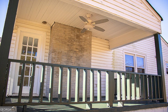 exterior space with ceiling fan