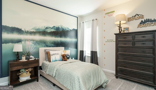 bedroom featuring multiple windows and light carpet