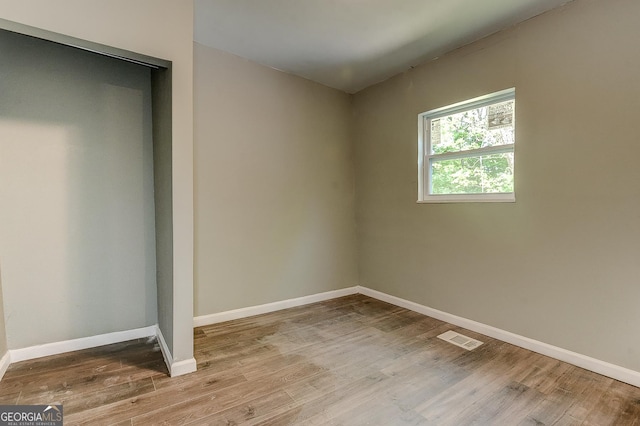 unfurnished bedroom featuring light hardwood / wood-style flooring