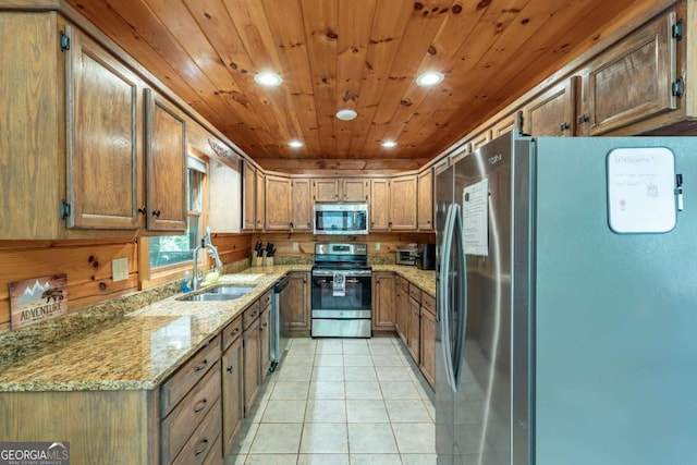 kitchen with sink, light stone counters, light tile patterned floors, wood ceiling, and appliances with stainless steel finishes