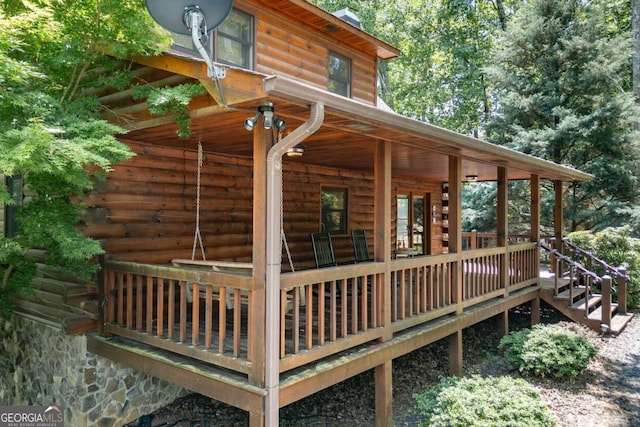 deck featuring covered porch