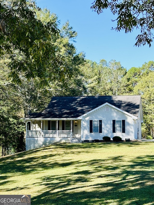 single story home with a front lawn and a porch