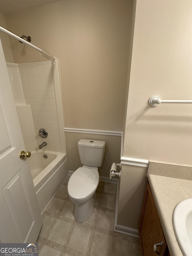 full bathroom with shower / bathing tub combination, vanity, and toilet