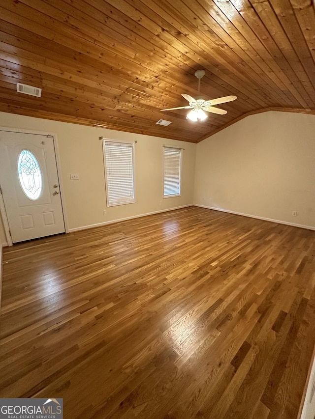 interior space with ceiling fan, wooden ceiling, vaulted ceiling, and wood-type flooring