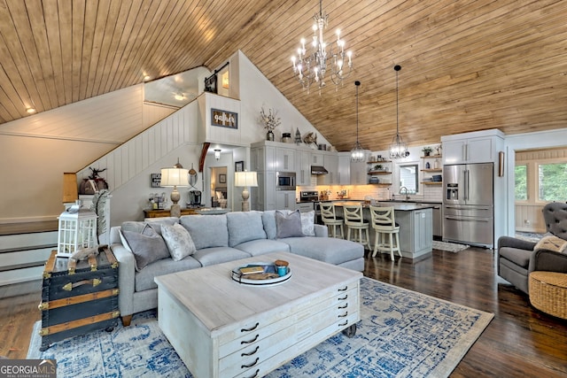 living room with dark hardwood / wood-style floors, wood ceiling, high vaulted ceiling, and an inviting chandelier