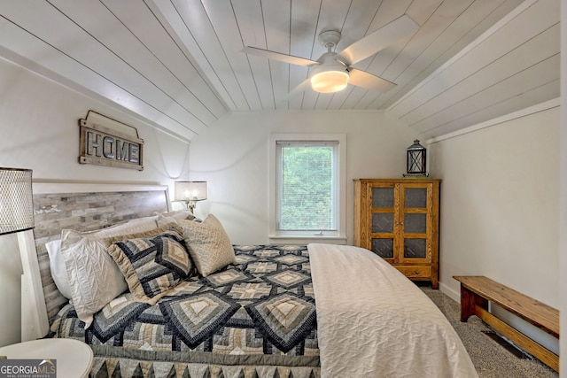 carpeted bedroom with ceiling fan and wooden ceiling