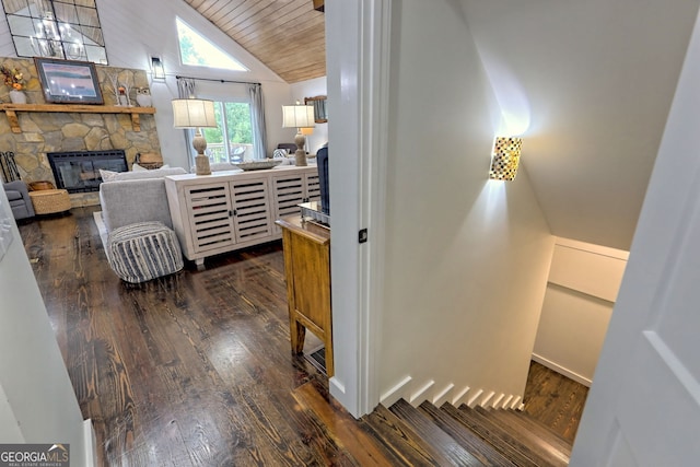 interior space with wooden ceiling, dark wood-type flooring, and lofted ceiling