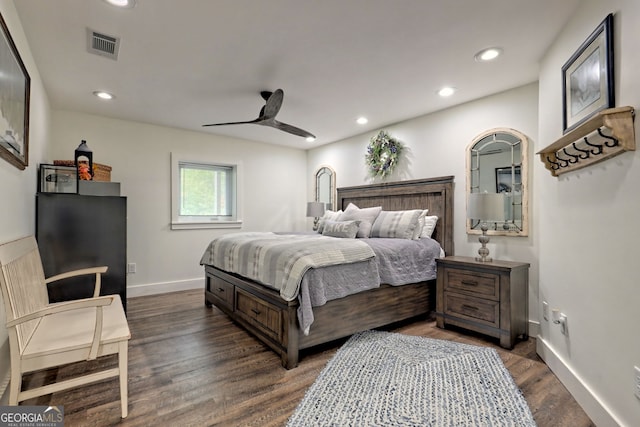 bedroom with ceiling fan and dark wood-type flooring