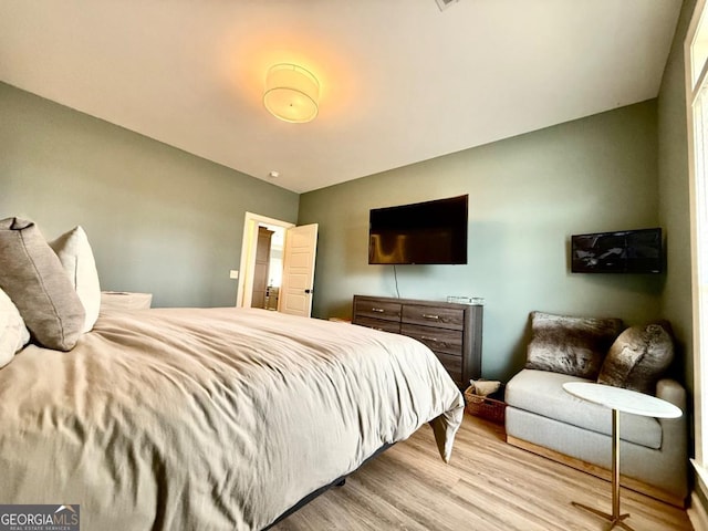 bedroom featuring light wood-type flooring