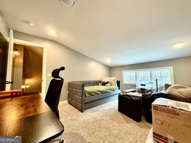 bedroom with carpet flooring and vaulted ceiling