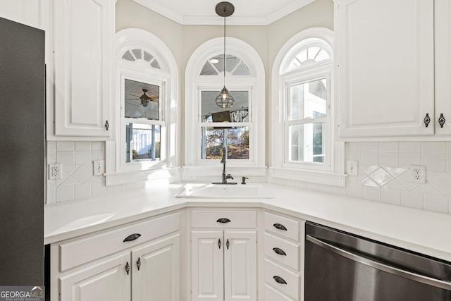 kitchen with white cabinets, dishwasher, a healthy amount of sunlight, and hanging light fixtures