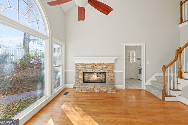 living room with plenty of natural light and light wood-type flooring