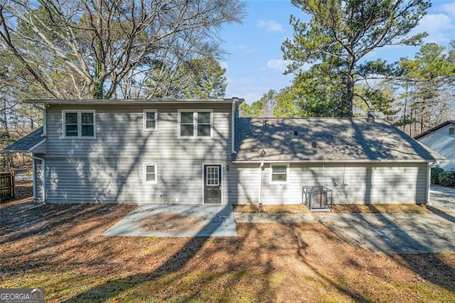 rear view of property with a patio area