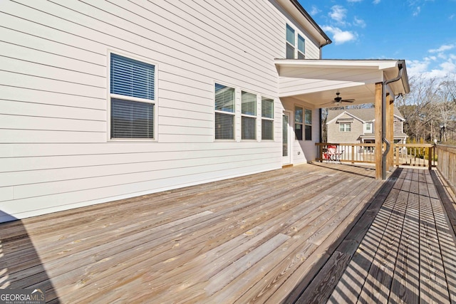 wooden terrace with ceiling fan