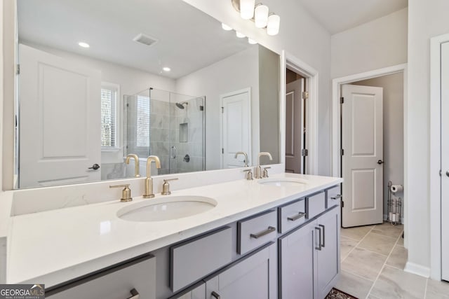 bathroom featuring a shower stall, double vanity, recessed lighting, and marble finish floors