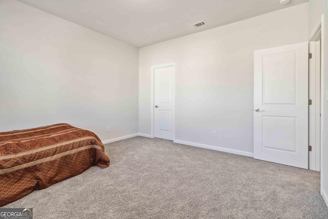 bedroom featuring carpet flooring