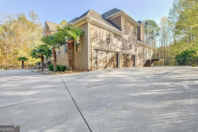 view of home's exterior with a garage